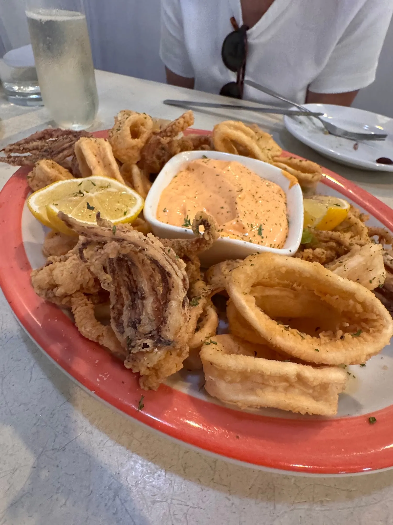 Fried calamari with lemon and a dipping sauce